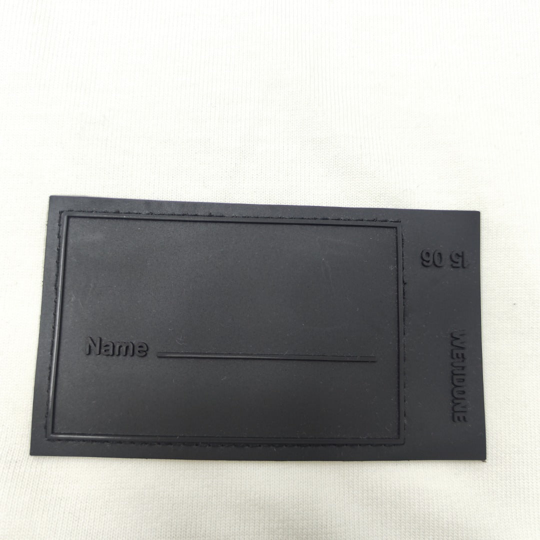 WE11D0NE TRACK Embossed Banner T-Shirt