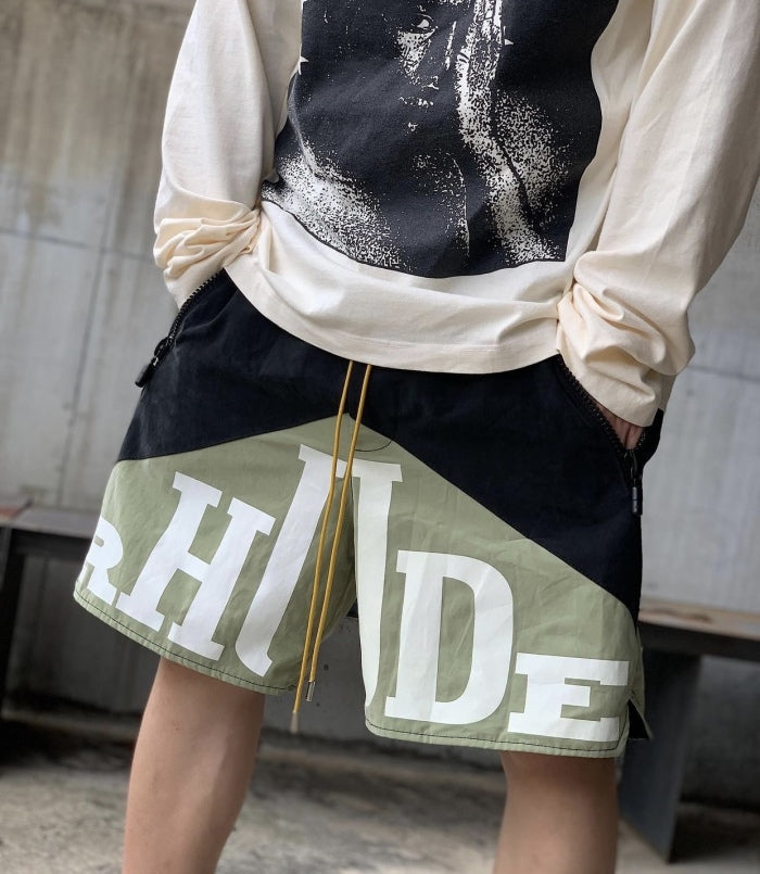 RHUDE vintage logo print two-tone drawstring shorts