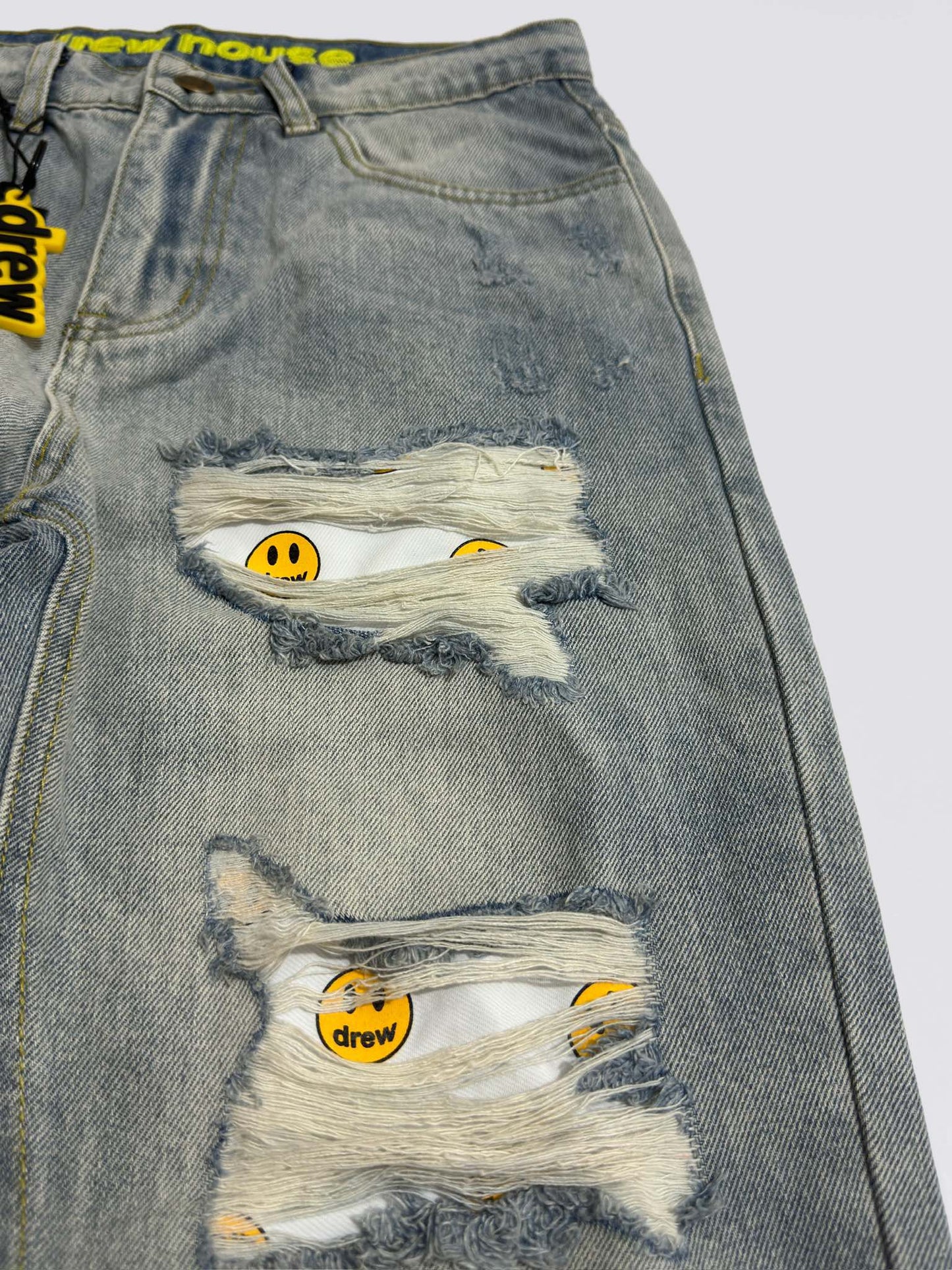 Drew House Smiley Face Jeans With Holes