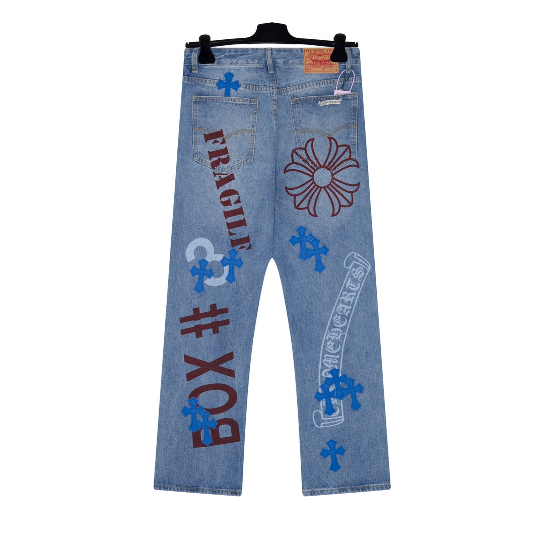 25SS new arrival Cross and Sanskrit Limited Edition Graffiti Print Leather Patch Denim Jeans