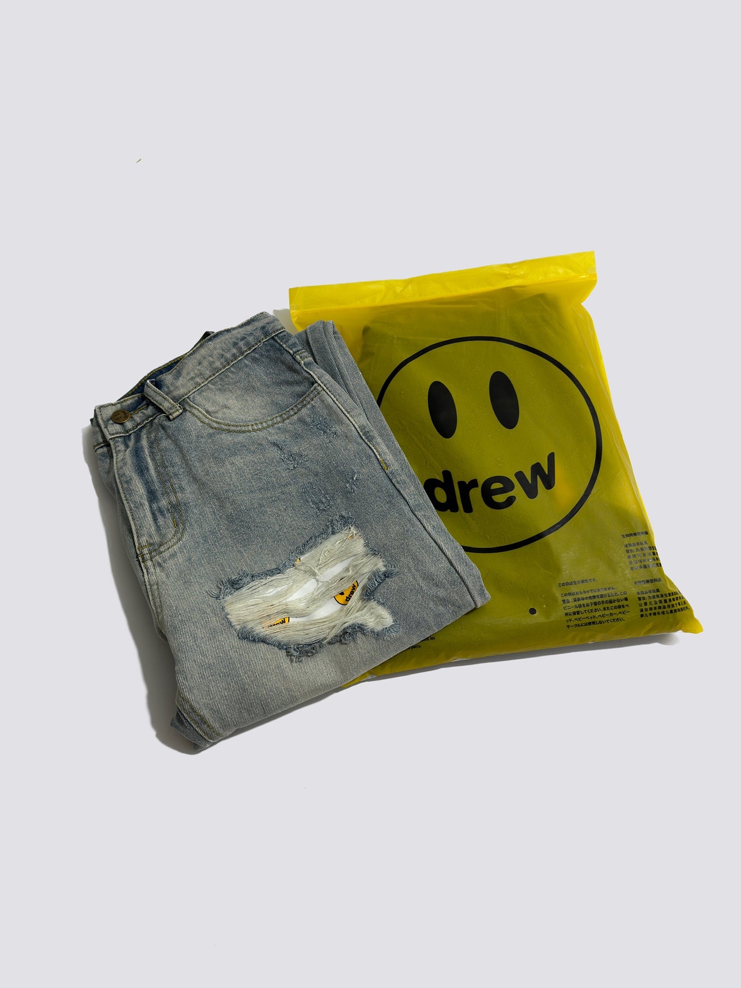 Drew House Smiley Face Jeans With Holes